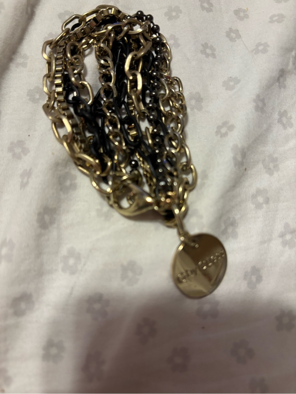 G by Guess Gold and Black Multi-Chain Bracelet with Logo Disc
